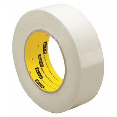 3M 5423 UHMW Slick Surface Tape is a transparent polyethylene film tape with a rubber adhesive, measuring 1 inch wide by 36 yards long and 11.7 mils thick. It provides a low-friction, wear-resistant surface suitable for lining chutes, guides, and conveyor beds to reduce material drag and noise in packaging, material handling, and automation applications.