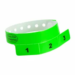 Vinyl security wristband with 'Stubs Void If Detached' tamper-evident design. Measures 10 inches in length and 3/4 inch in width. Green color. Pack of 500. Used for access control and identification at events, hospitals, and industrial facilities.
