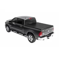 This roll-up tonneau cover is constructed from black vinyl and measures 75 1/2 inches in length. It features a bolt-on mounting system for secure attachment to the truck bed. Designed to protect cargo from weather and theft, it provides a low-profile cover for pickup trucks
