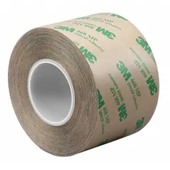This general purpose adhesive transfer tape features a transparent acrylic adhesive on a polycoated kraft paper liner. It is 6 inches wide, 20 yards long, and 5.2 mil thick with a repositionable bond type, allowing temporary placement before permanent adhesion. Suitable for bonding, mounting, and splicing in industrial assembly, graphics, and packaging applications.