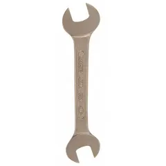 This double-end open end wrench is made of aluminum bronze with a natural finish, providing nonsparking properties for use in environments where flammable gases, vapors, or dusts are present. It features head sizes of 1/2 in and 11/16 in, with an overall length of 6-1/2 in. Suitable for turning nuts and bolts in hazardous locations such as chemical plants, refineries, and grain handling facilities.