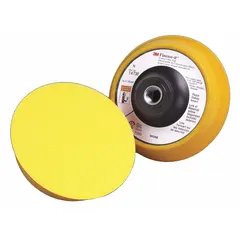 This 3M backing pad has a 5-inch diameter and 1-inch thickness, featuring a 5/8"-11 internal-thread connection for use with compatible hook-and-loop sanding discs. It is a non-vacuum type, providing a firm surface for sanding applications in metalworking, woodworking, and automotive finishing.