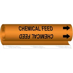 Orange wrap-around pipe marker with black 'Chemical Feed' legend and directional arrows. Fits pipe outer diameters from 1-1/2 to 2-3/8 inches. Used to identify pipes carrying chemical feed substances in industrial facilities for clear pipe identification.